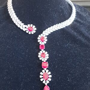 Beautful Oval cut Ruby created Sapphire necklace.17" length Silver metal.Rhodium